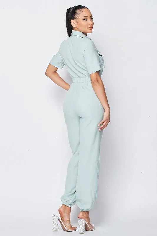 CINCHED WAIST SHORT SLEEVE BUTTON-UP JUMPSUIT