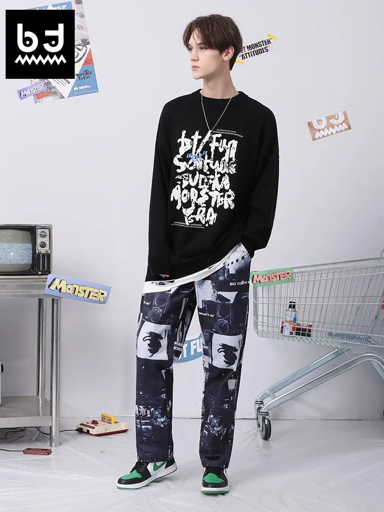 High-waisted, mid-length slacks full of letters and graffiti